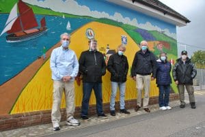 Station volunteers who organised the new mural